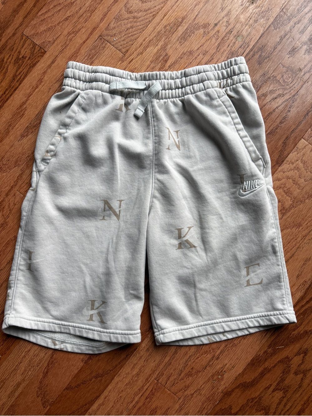 Nike boys shorts, cotton, tan with letters and checks, youth XL (14-16)